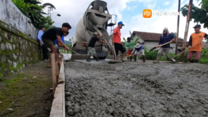 Pengusaha Asal Mategal Viral Usai Perbaiki Jalan Desa dengan Dana Pribadi