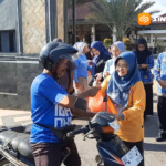 KORPRI Bagikan 978 Paket Beras untuk Ojek dan Pekerja Informal di Magetan