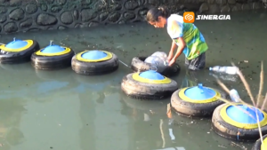 Aksi Nyata Hari Bumi, Pemuda Ponorogo Pasang Barikade Sampah di Sungai Tambak Kemangi